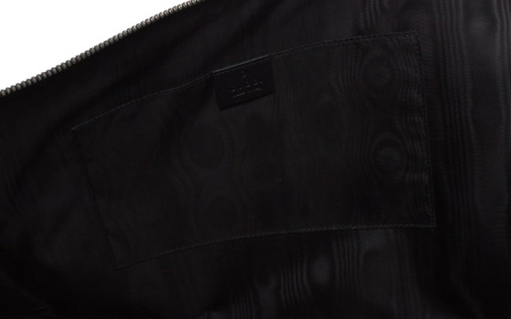Gucci, Clutch con cerniera in pelle nera Guccy x SEGA (photo 7 of 12)