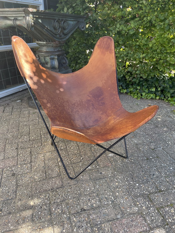 Image 1 of Jaren 60 vlinderstoel met tuiglederen zitting