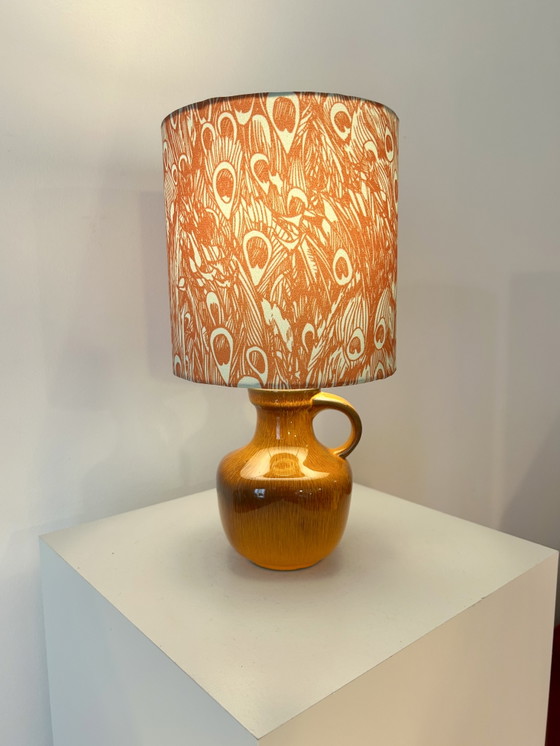 Image 1 of Lampada vintage arancione brillante, senza fili, adatta per uso esterno.