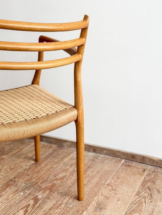 Image 1 of Esszimmerstuhl mit Armlehnen aus Eichenholz, Modell 62 für J.L. Moller