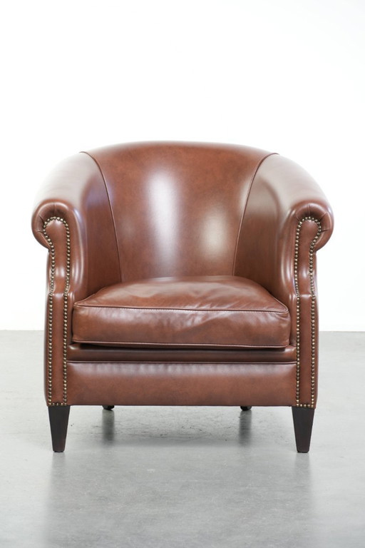 Comfortabele en mooie cognac kleurige rundleren clubfauteuil in Engelse stijl