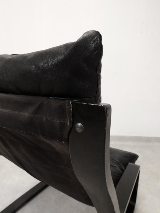 Image 1 of  high-back lounge chair in black leather