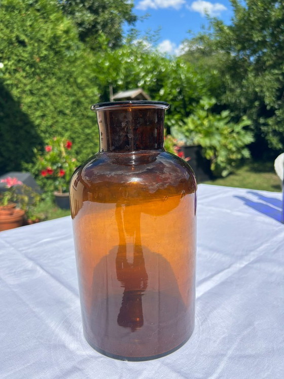 Image 1 of 2 bottles: Apothecary bottle + Elegant turquoise glass bottle, vintage turquoise
