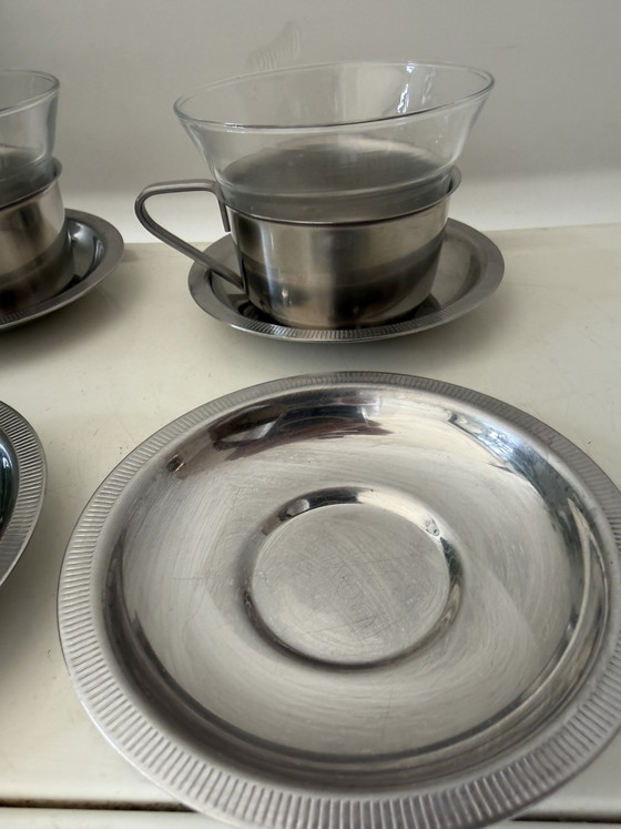 Image 1 of Juego de 4 vasos de té con soporte y platillos cromados.