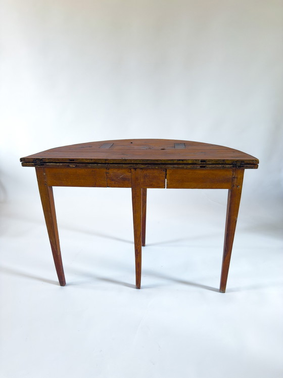 Image 1 of Table demi-lune en pin du XIXe siècle