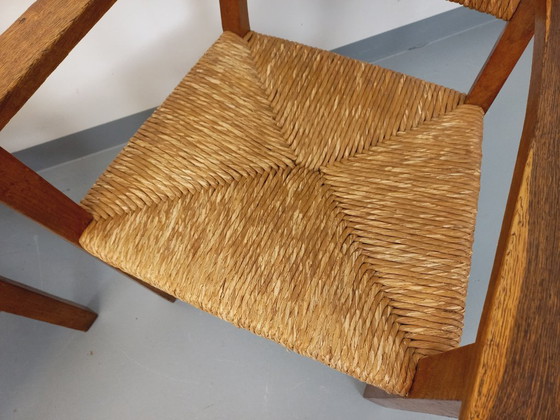 Image 1 of Suite van 2 vintage Brutalistische fauteuils in eiken en stro uit de jaren 60