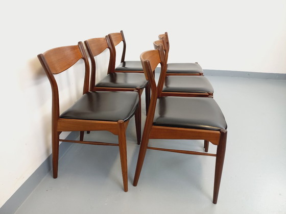 Image 1 of Set of 6 vintage Danish Scandinavian chairs by Aerthoj Jensen & Molholm in teak and skai from the 1960s