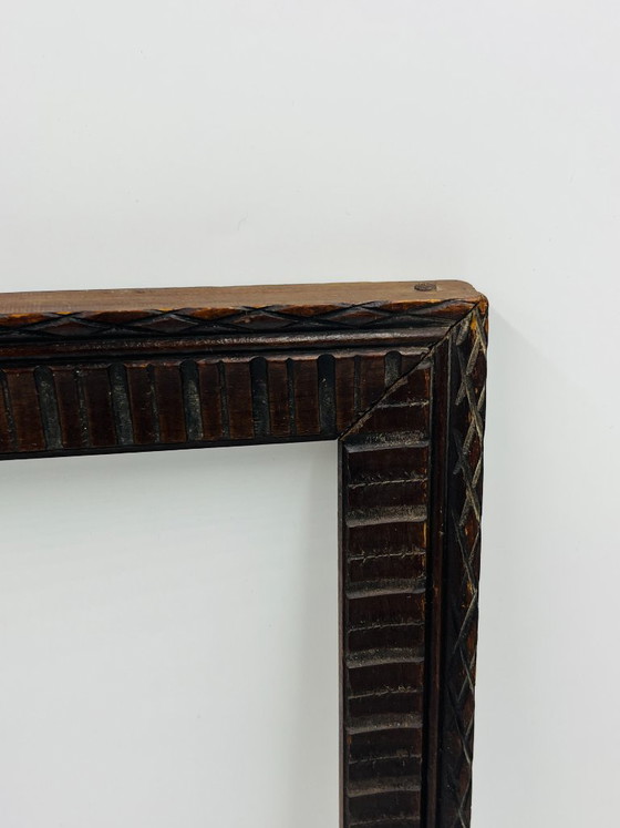 Image 1 of Vintage donkerhouten guillochelijst 33x28