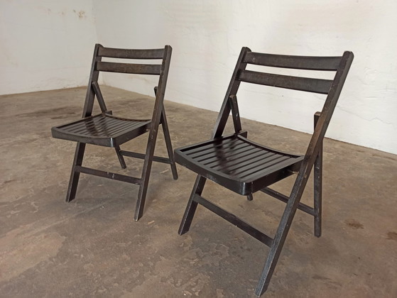 Image 1 of 2 vintage zwarte houten klapstoelen