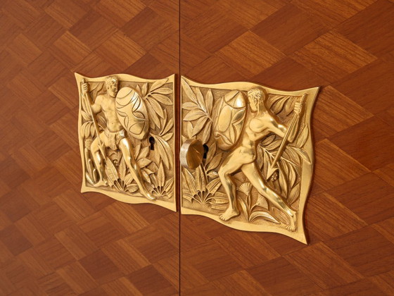 Image 1 of Meuble à deux portes Jules Leleu en bois de cerisier marqueté de bronze, 1940