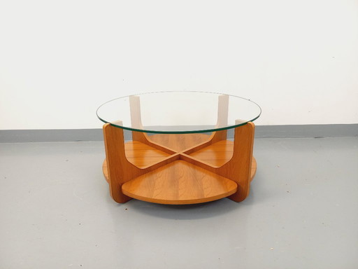 Vintage round coffee table with 2 tops by Hugues Poignant, in teak and glass from the 60s and 70s