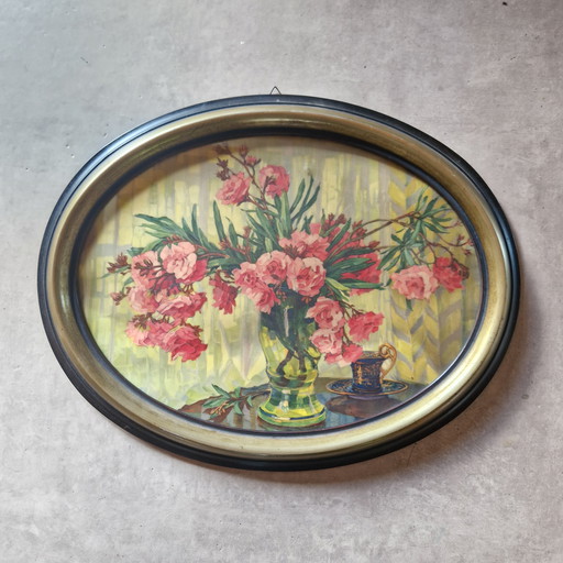 Antique printing print in oval frame behind glass flower painting