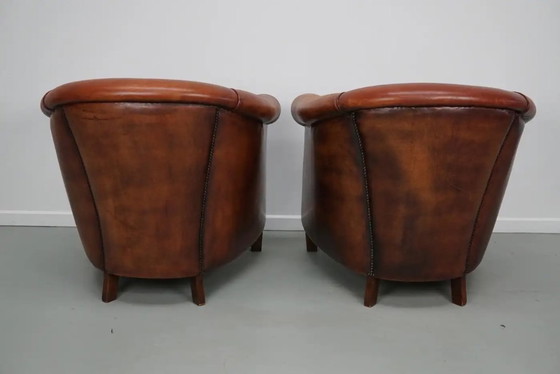 Image 1 of Vintage Nederlandse clubfauteuils in cognackleurig leer, set van 2