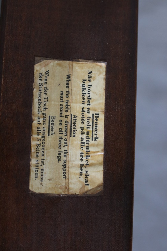 Image 1 of Table de salle à manger extensible en bois de rose par Henning Kjaernulf