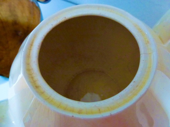 Image 1 of Ceramic Teapot with thermal Chrome casing which keeps the contents hot (or cold).