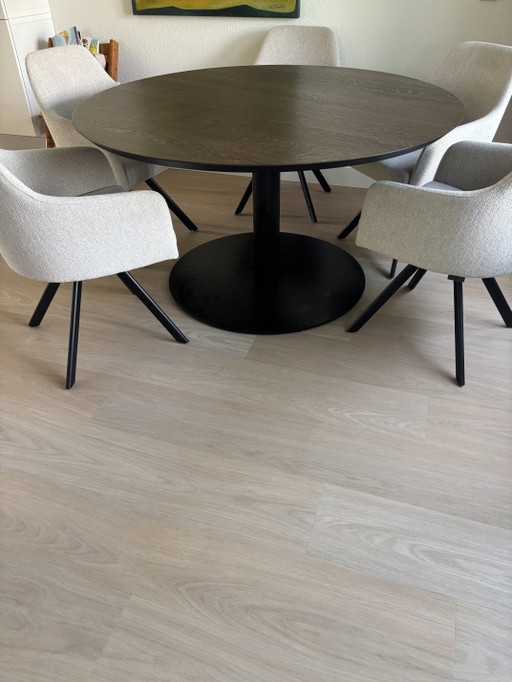 Round solid oak table with veneer top. Bought at Maison Manon.