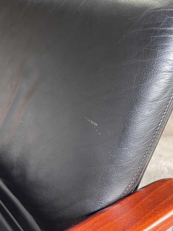 Image 1 of Vintage 2-seater lounge sofa — black leather & solid wood, Italy, 1970s–80s