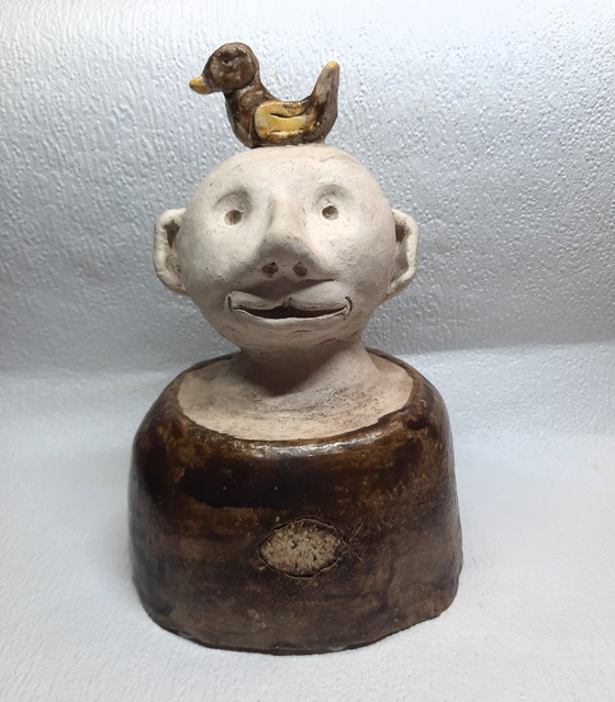 Image 1 of (W006) Unique Folk Art Ceramic Sculpture – "The Happy Bald Man with a Duck on His Head"