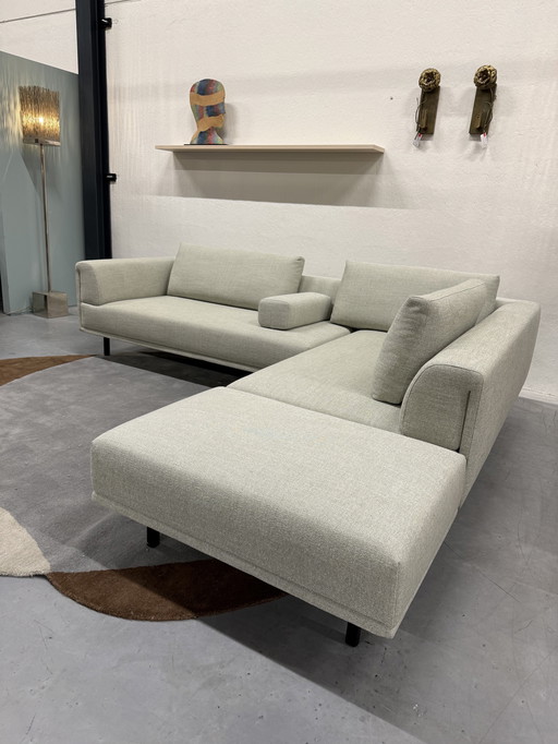 Sofá esquinero Eyye Dura Lounge con puf de tela Milton Spirit