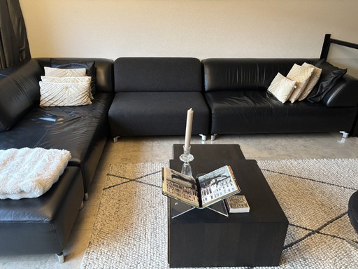 Leolux Faya Lobi corner sofa with loose footstool - black leather and fabric loose element piece