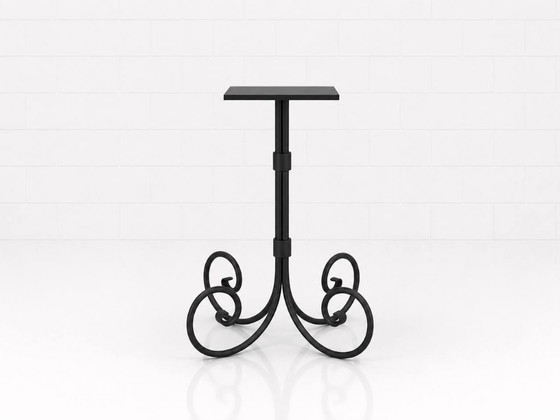 Image 1 of Decorative cast iron base with sculpturally curved underframe