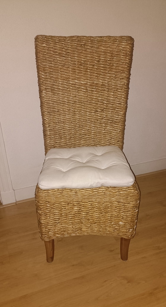 Image 1 of Tweedehands Eikenhouten eettafel en 6x Rotan stoelen 