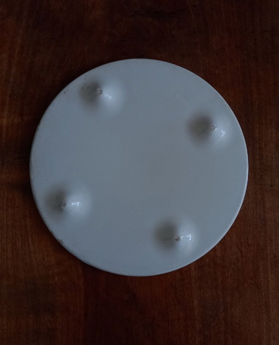 Image 1 of Salvamanteles pequeño y redondo de loza