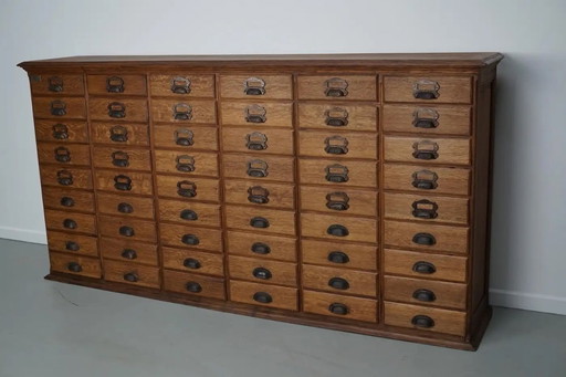 Antique French oak archive/apothecary cabinet by Chouanard, ca. 1910