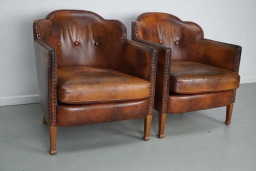 Sillones de club holandeses vintage en cuero color coñac, juego de 2