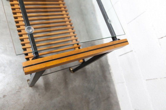 Image 1 of Serveerwagen uit de jaren 60, hifi-kast op wieltjes in teakhout, zwart metaal en glazen blad.