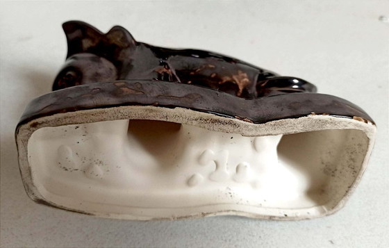 Image 1 of Een paar boekensteunen uit de jaren 60 met een gestileerd stierenontwerp.