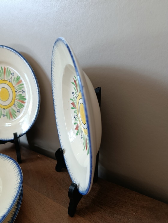 Image 1 of 4 piatti antichi in stile bretone della manifattura Longchamp/Francia