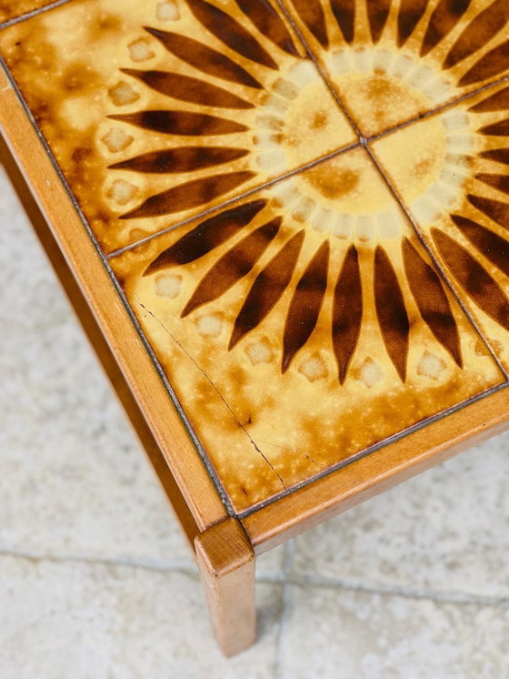 Image 1 of Vintage teak and ceramic coffee table with sun motif, 1960