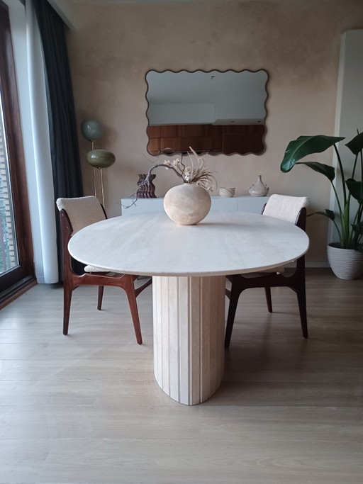 Beautiful dining table made of solid travertine natural stone