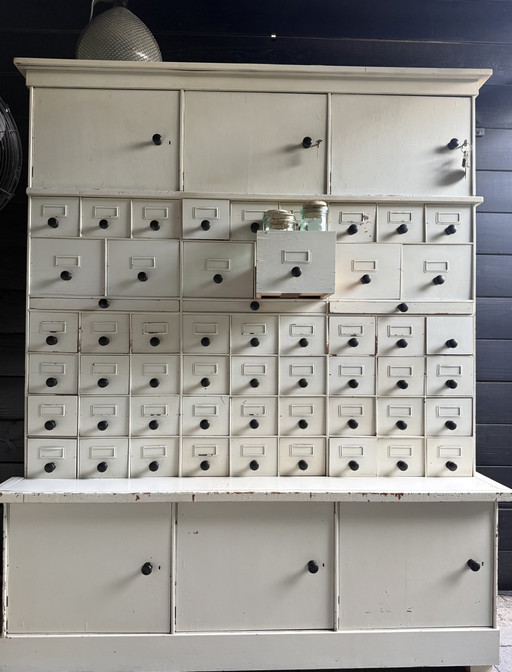 Vintage apothecary cabinet/shop cabinet.