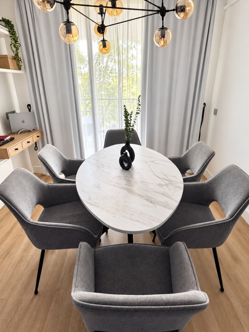 Ovaler Porcelanosa Steintisch nach Maß 150 × 85 cm + 6 gepolsterte Stühle