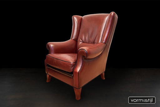 2 fauteuils à oreilles Mol & Geurts en cuir de taureau