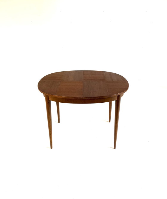 Image 1 of Vintage extendable teak dining table '60