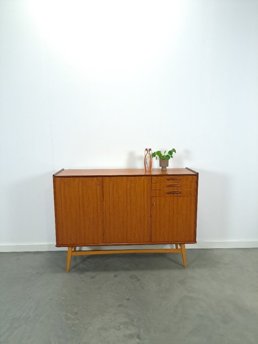 Teak cabinet with sloping legs and drawers from Sweden
