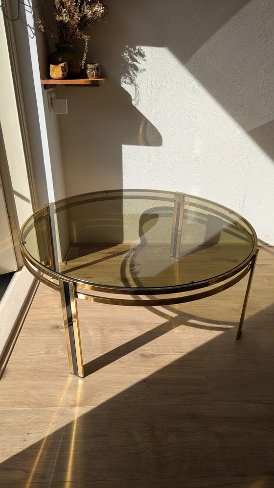 Image 1 of Hollywood Regency salontafel van zwart messing en gerookt glas