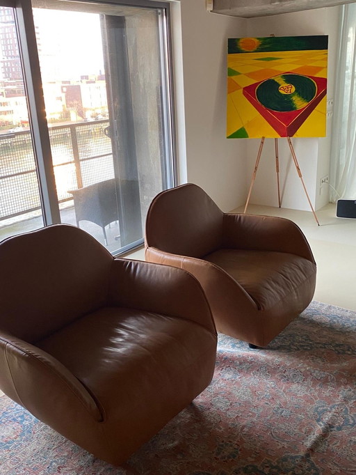 Conjunto de dos sillones de diseño Hülsta en piel color coñac