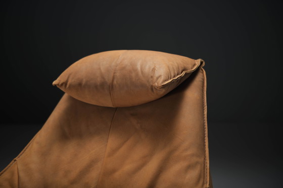 Image 1 of Chaise longue pivotante Delantra en cuir cognac par Gerard van den Berg pour Montis