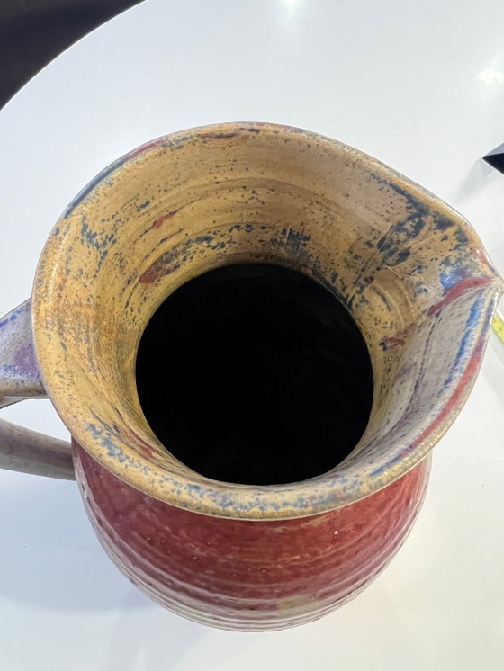 Image 1 of Een keramisch kunstwerk uit Mid Century met een sterk karakter: deze vintage kan uit de jaren 50/60 maakt indruk met zijn georga