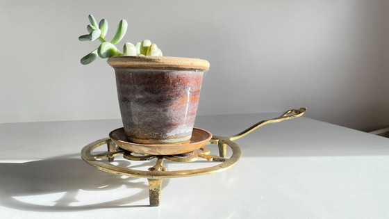 Image 1 of Solid brass trivet