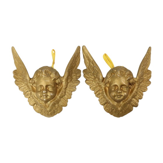 Image 1 of Teste d'angelo in metallo dorato