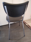 Sedia da scrivania vintage De Wit, struttura cromata, rivestimento nero.