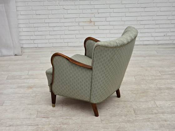 Image 1 of Deense fauteuil uit de jaren 60, lichtblauwe meubelstof, beukenhout.