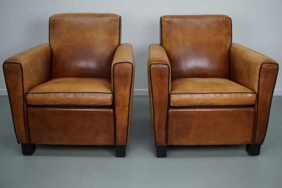 Image 1 of Vintage Nederlandse clubfauteuils van cognackleurig leer, set van 2