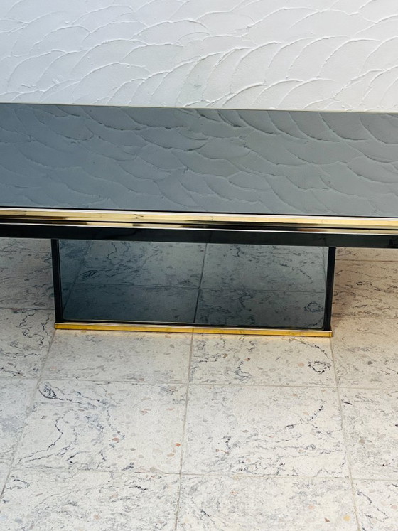 Tweekleurige salontafel van messing en zwart spiegelglas van Fedam (photo 18 of 18)