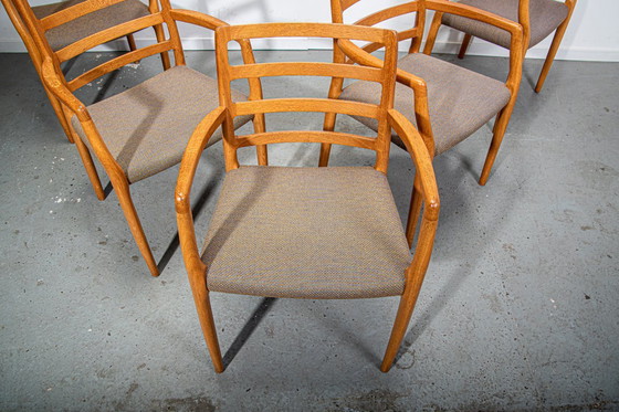 Image 1 of J.L. Mollers Model 68 armchairs in Oak with original fabric. Made in Denmark Circa 1990